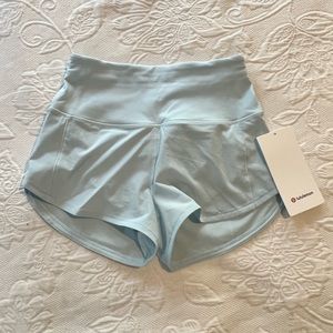 NWT Lululemon speed up size 0. 2.5 inch.  Never worn. Powder blue.